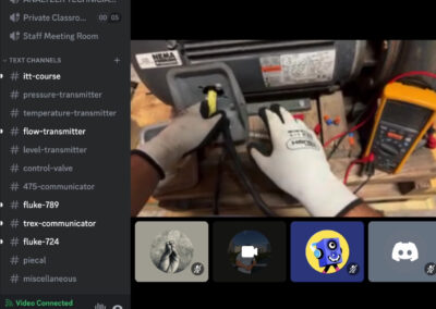 an instrument technician is demonstrating using a meter to test via virtual class